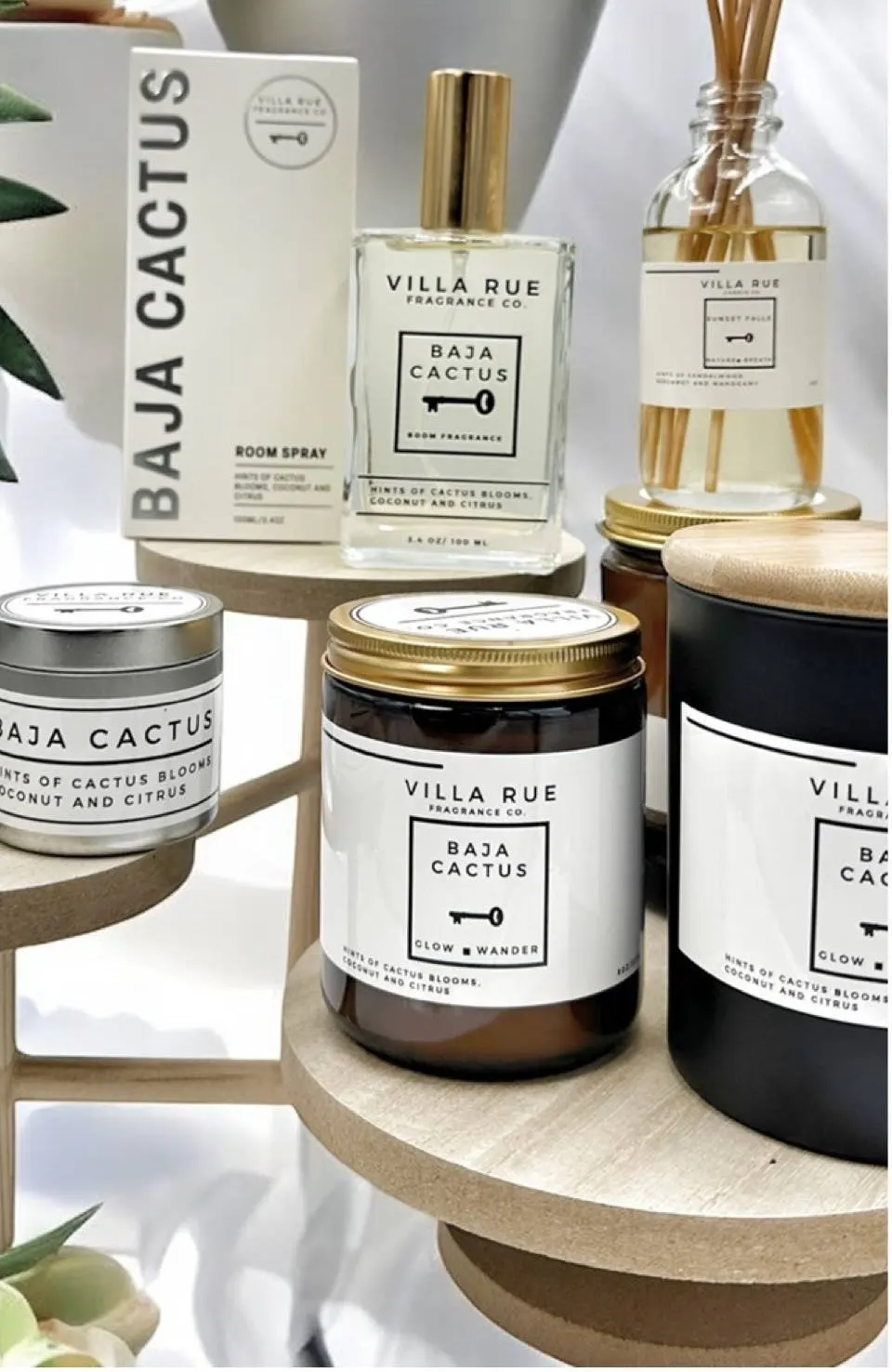 The Villa Rue collection — candles, a reed diffuser and a room mist styled together